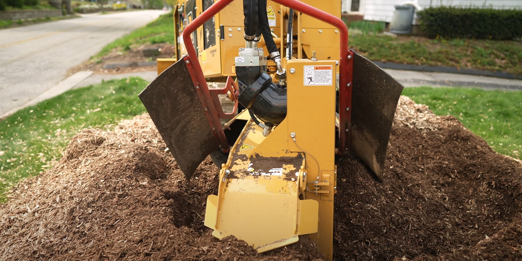 Industrial stump grinding equipment removing tree stump safely in Compton, CA residential property